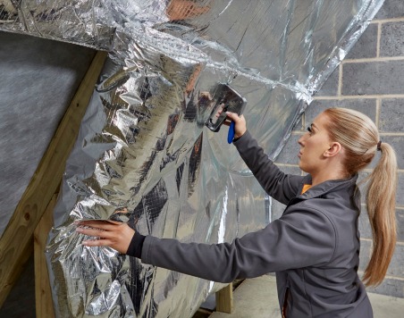 Professional SuperQuilt insulation installation in progress - Easy-Sprayaway Scotland